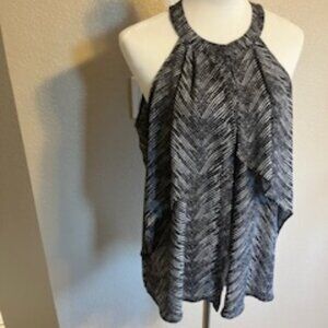 Worthington, Large sleeveless, halter neck blouse. Button up front.Black/White.